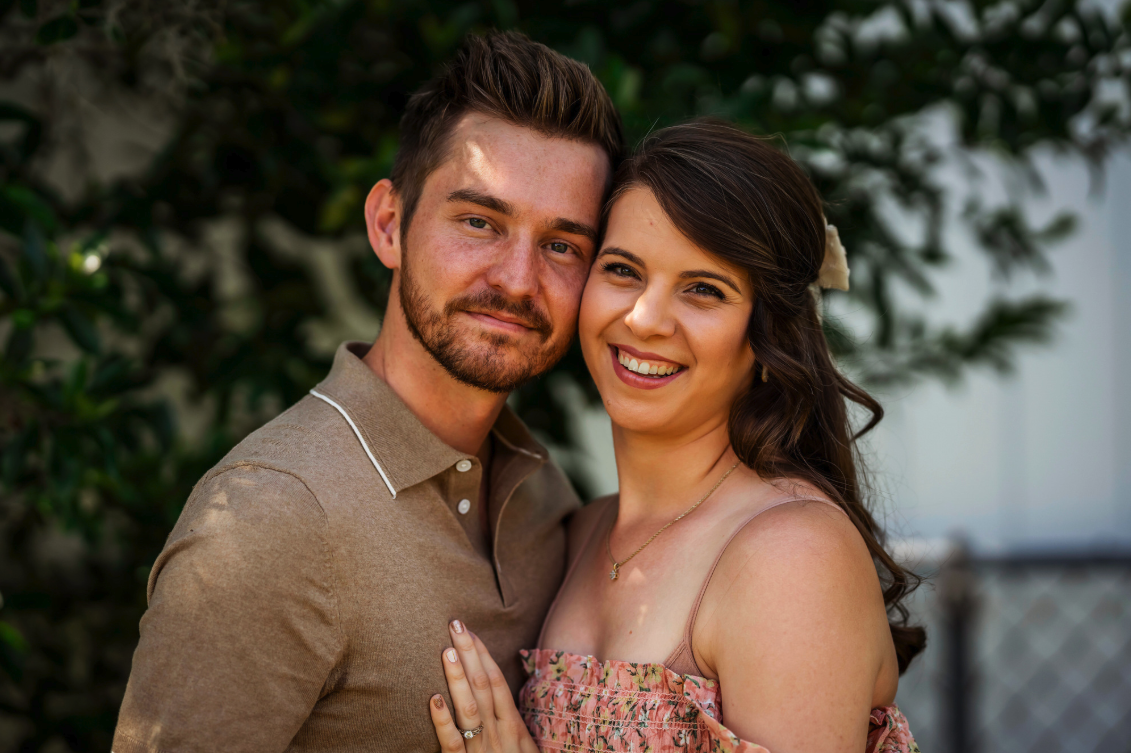 a man and woman posing for a picture